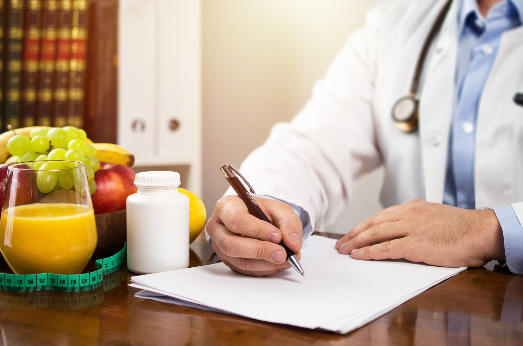 Nutritionist writing diet plan, dietician consultation, health
